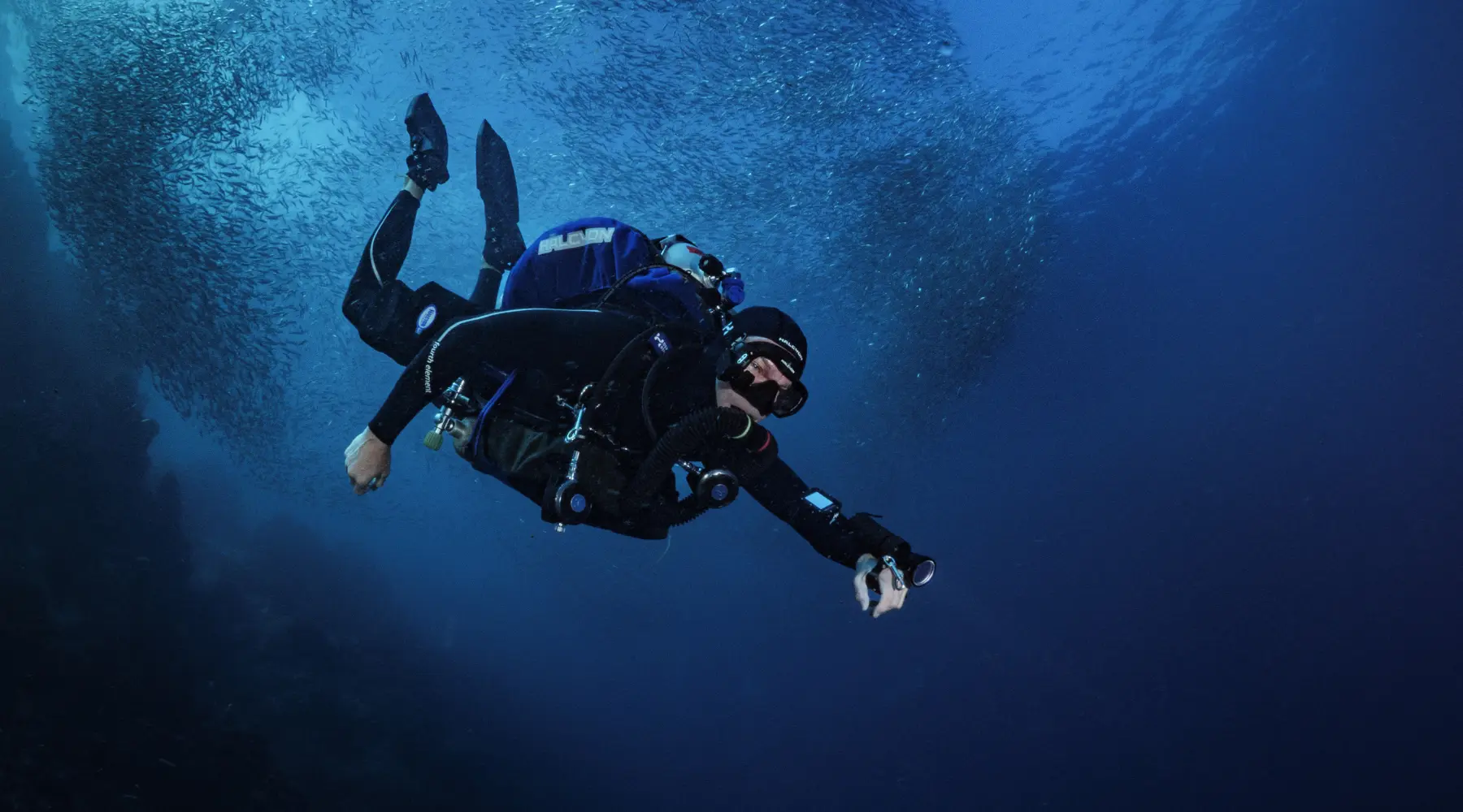 Diver with Symbios handset underwater