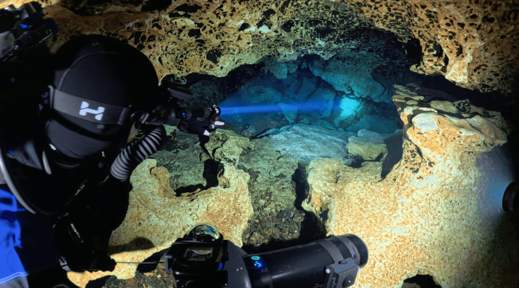 Diver in a cave with Phaser light