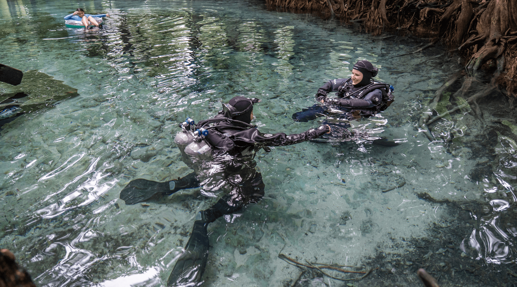 Divers with Halcyon gear at the surface
